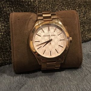 Rose gold Michael Kors watch.